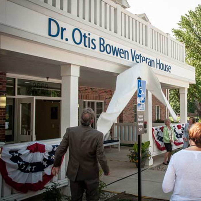 Front of Dr. Otis Bowen Veteran House with people